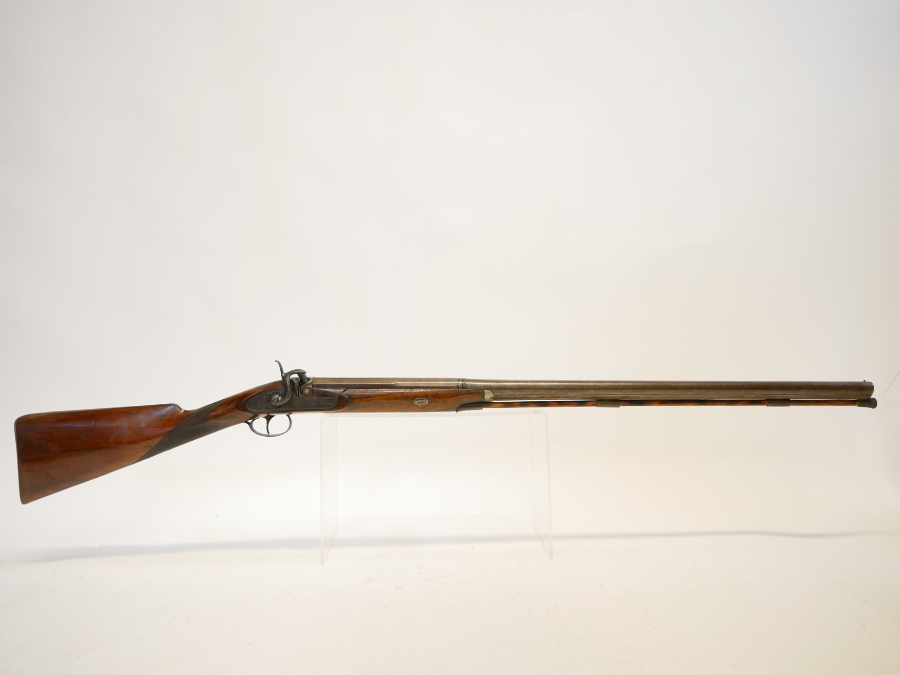 Discover our Cooper and Bates 14 bore single barrel shotgun with 31 inch Damascus Spanish form barrel. Shop now for top quality firearms!