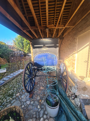 Discover our 1860 Brougham horse-drawn carriage by Frederick Sanderson. Built for comfort and city travel, it seats 2-4 people. Come view this historical gem today.