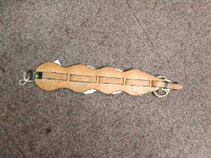 A vintage  4 horse Brasses on leather strap, probably late 19- early 20th century, been used from one equestrian family.  Size  46 cm long.
