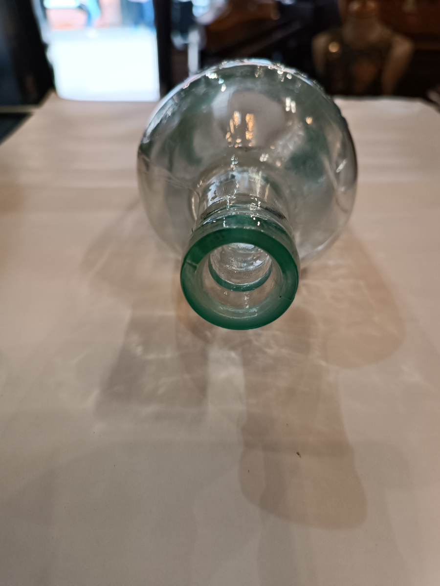 Discover a 19th-century Toddy Bottle by C. Wright & Son Ltd, London. This unique piece is 10 inches tall, perfect for mixing spirits and sugar. Shop now for quality antiques!