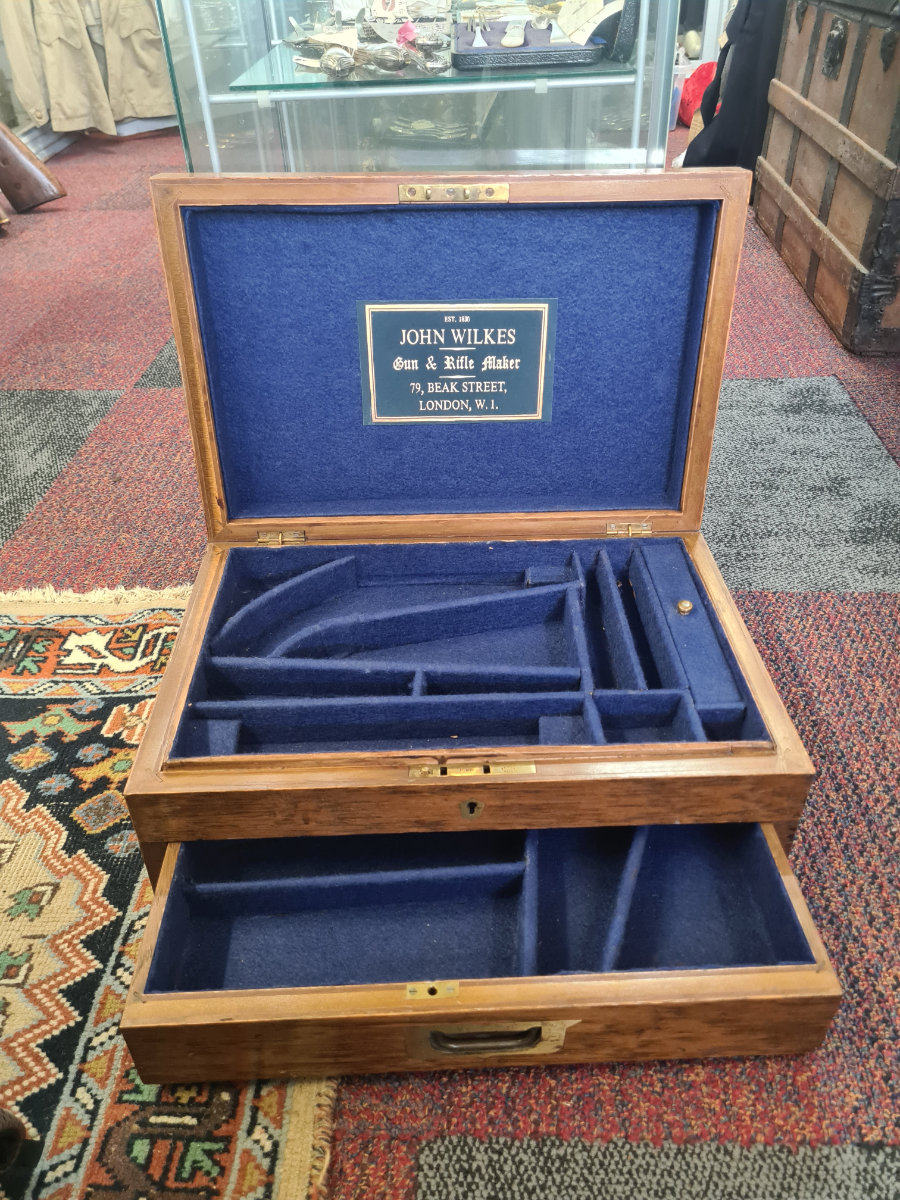 Explore our collection of mid-20th century artifacts. Buy the unique John Wilkes two-draw pistol and gambling token case, size 41x27 cm. Act now!