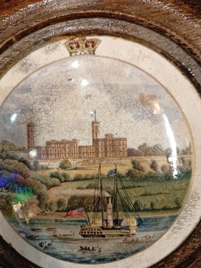 Discover our exquisite selection of 19th century Prattware pot lids, featuring an Osborne house scene with a charming wooden frame. Despite slight wear and tear, its unique 19 cm diameter size sets it apart. Shop now!