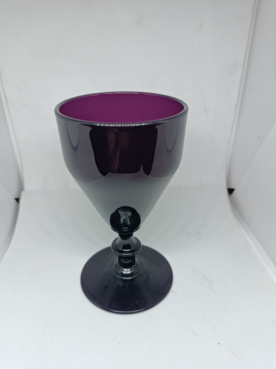 Discover our 19th century amethyst drinking glass collection. This rarity, in good condition, stands 13cm tall. A must-have for antique collectors. Shop now!