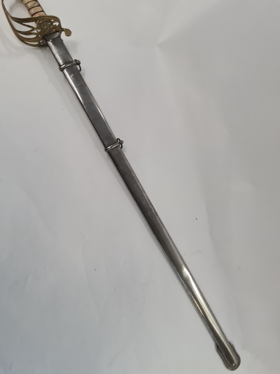 Explore our range of Victorian Regina India Reproduction 1854 Pattern Officers Swords and Scabbards. Buy our expertly restored, used items. Grab yours today!