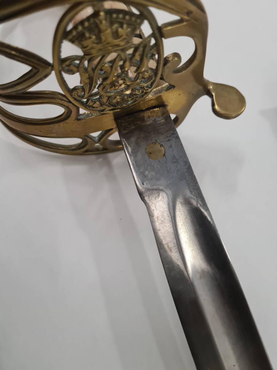 Explore our range of Victorian Regina India Reproduction 1854 Pattern Officers Swords and Scabbards. Buy our expertly restored, used items. Grab yours today!