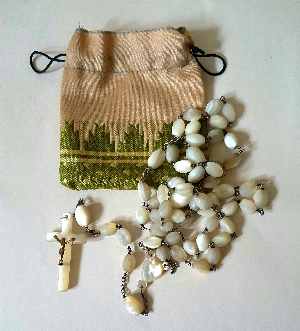 Discover our stunning vintage Mother of Pearl Shell Rosary, complete with a lovely cotton bag. Shop now to add elegance & devotion to your spiritual routine!