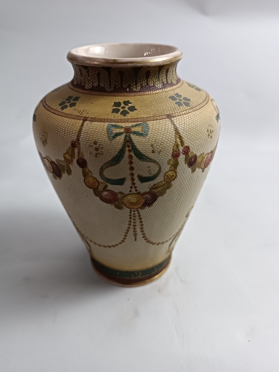 Discover our collection of Royal Doulton Burslem Tapestry Vases, circa 1886-1902 with unique green print marks. Perfect for enriching any decor, these 15cm high and 11cm wide vases are a must-have. Shop now!