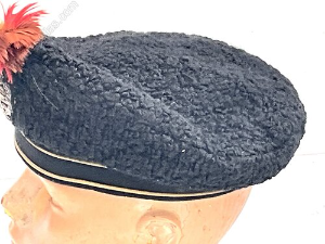 Royal Tank Regiment Officers Full Dress Astrakhan Beret, good early example with bullion embroidered regimental badge to the centre. Black mohair band with two gold wire strips bordering. Complete with the regimental feather hackle plume. Interior with brown leather sweatband worn and torn cloth lining. Good overall condition. Reference BBS
 Tel: +44 7505 165 843 We accept online payments for all our items listed: Bank transfer cash on collection or if wishing over the phone using your debit or credit cards, also doing layby payments plan, or email giving your address details & contact number and we shall send you your items invoice to make payment with your card. Send your request to - john.strong2@gmail.com