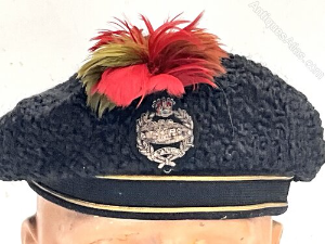 Royal Tank Regiment Officers Full Dress Astrakhan Beret, good early example with bullion embroidered regimental badge to the centre. Black mohair band with two gold wire strips bordering. Complete with the regimental feather hackle plume. Interior with brown leather sweatband worn and torn cloth lining. Good overall condition. Reference BBS
 Tel: +44 7505 165 843 We accept online payments for all our items listed: Bank transfer cash on collection or if wishing over the phone using your debit or credit cards, also doing layby payments plan, or email giving your address details & contact number and we shall send you your items invoice to make payment with your card. Send your request to - john.strong2@gmail.com