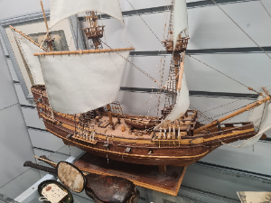 Discover our Caribbean model of the Mayflower, complete with wooden stand. In fair condition. Shop now for this unique piece of historical memorabilia!