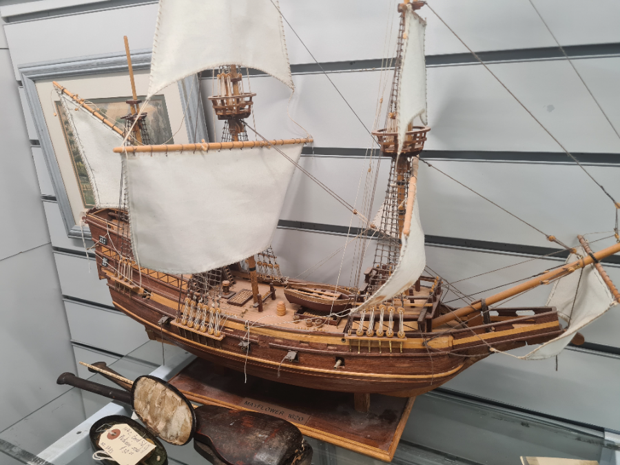 Discover our Caribbean model of the Mayflower, complete with wooden stand. In fair condition. Shop now for this unique piece of historical memorabilia!