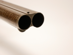 Discover Showell's 12 bore double barrel shotgun, an antique with 29.5inch Damascus barrels. No licence needed. Explore and own it now!