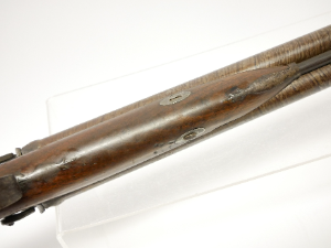 Discover Showell's 12 bore double barrel shotgun, an antique with 29.5inch Damascus barrels. No licence needed. Explore and own it now!