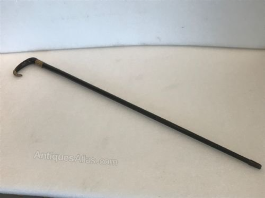 Primary image for Stunning  Horned gold handled walking stick / sword