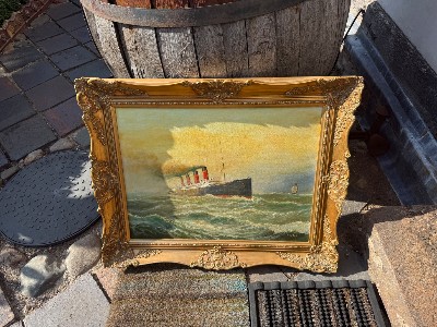 A beautiful oil painting of RMS Mauretania by maritime artist and former marine radio officer for Cunard, Fred Tordoff. Size 77cm x 63cm with frame.

The Ship:
RMS Mauretania was a British ocean liner built for the Cunard Line by Swan, Hunter & Wigham Richardson in Wallsend on the River Tyne. Launched in 1906, she was the largest ship in the world until RMS Olympic was launched in 1910. Mauretania became famous for her speed, securing the eastbound Blue Riband on her maiden return voyage in December 1907 and the westbound record in 1909. She went on to hold both records for an impressive 20 years.

During the First World War, Mauretania was requisitioned by the British government and served as both a hospital ship and a troopship. She returned to Cunard's passenger service in 1919 and continued operating for many years. In September 1934, Cunard-White Star retired the liner, and she was eventually scrapped at Rosyth in 1935.

The Artist:
Frederick Tordoff (1939-Present) was born in Whitley Bay, on the northeast coast of England. The area
has a rich maritime heritage and Fred sketched the local scenes and landmarks.

After a stint in the Royal Air Force, Tordoff studied Marine Radio and Electronics at the
Kingston-Upon-Hull College. Hull had a thriving school of marine art, and after visits to
art galleries and the Hull Whaling Museum, Tordoff was motivated to paint the keels,
sloops and whale ships that plied the waterways in the great age of sail.

Tordoff joined the Cunard Steamship Company as a Radio & Electronics Officer and
traveled the world. He continued to paint during these long sea voyages, and eventually
began to exhibit his work at local art groups and galleries in northern England.
The artist currently resides in New Jersey and continues to specialize in marine and
sailing subjects, including the Hudson River and the Nantucket and New Bedford
whaling fleets.

His paintings are in collections in throughout Great Britain, Europe and the United
States including Tim Casey and Susan Ostrowski’s home to be displayed at RYC this
evening.