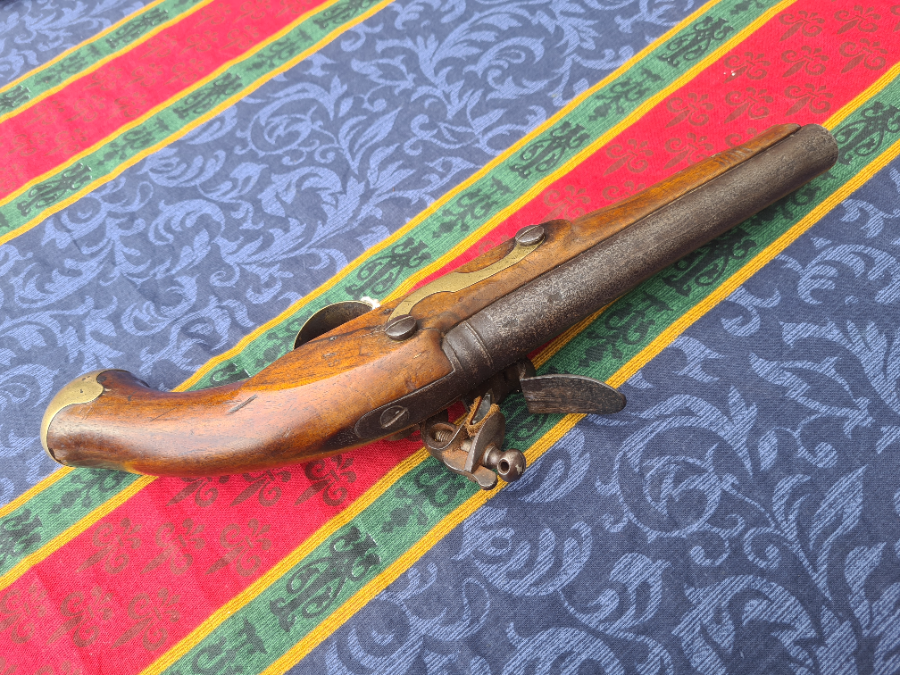 Discover our Thomas Barnett Flintlock Pistol - a mini version of a sea service pistol. In good condition with a 7inch barrel and 20 bore. Buy now!