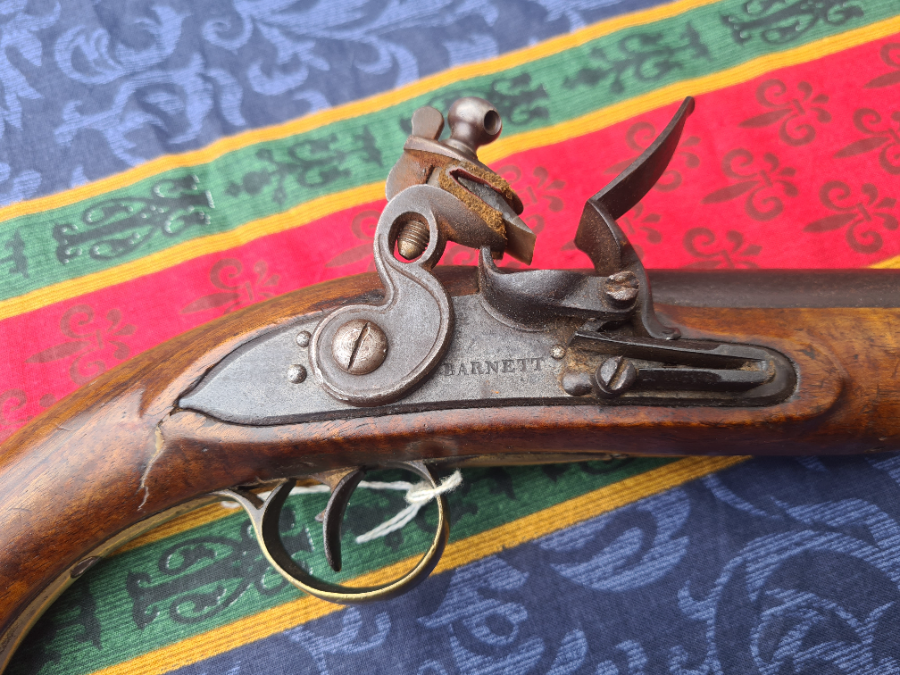 Discover our Thomas Barnett Flintlock Pistol - a mini version of a sea service pistol. In good condition with a 7inch barrel and 20 bore. Buy now!
