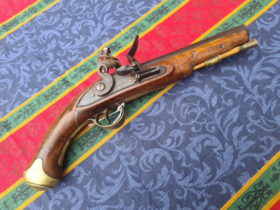 Discover our Thomas Barnett Flintlock Pistol - a mini version of a sea service pistol. In good condition with a 7inch barrel and 20 bore. Buy now!
