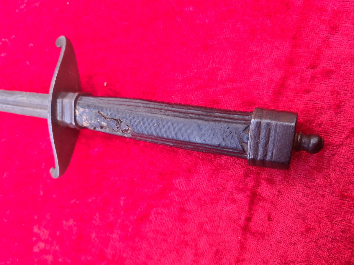 Explore our selection of unique 17th-century stilettos with boiled leather grips. Discover the historical charm of these rare finds. Shop now!