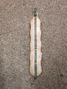 A vintage 5 horse brasses on the leather strap from one equestrian family.  Size  53 cm long.