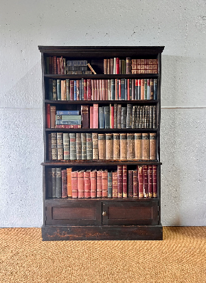Discover our handcrafted, solid pine library bookcases with an aged ebony stain finish. Perfect for any interior decor. Shop now to add style to your space!