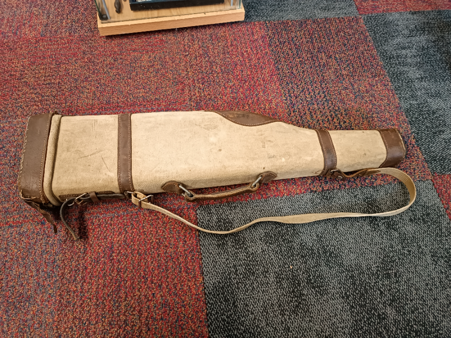 Discover our Vintage Canvas Gun Slip, 74 cm long with a comfy shoulder strap. Safeguard your firearm in style. Browse and order yours today!