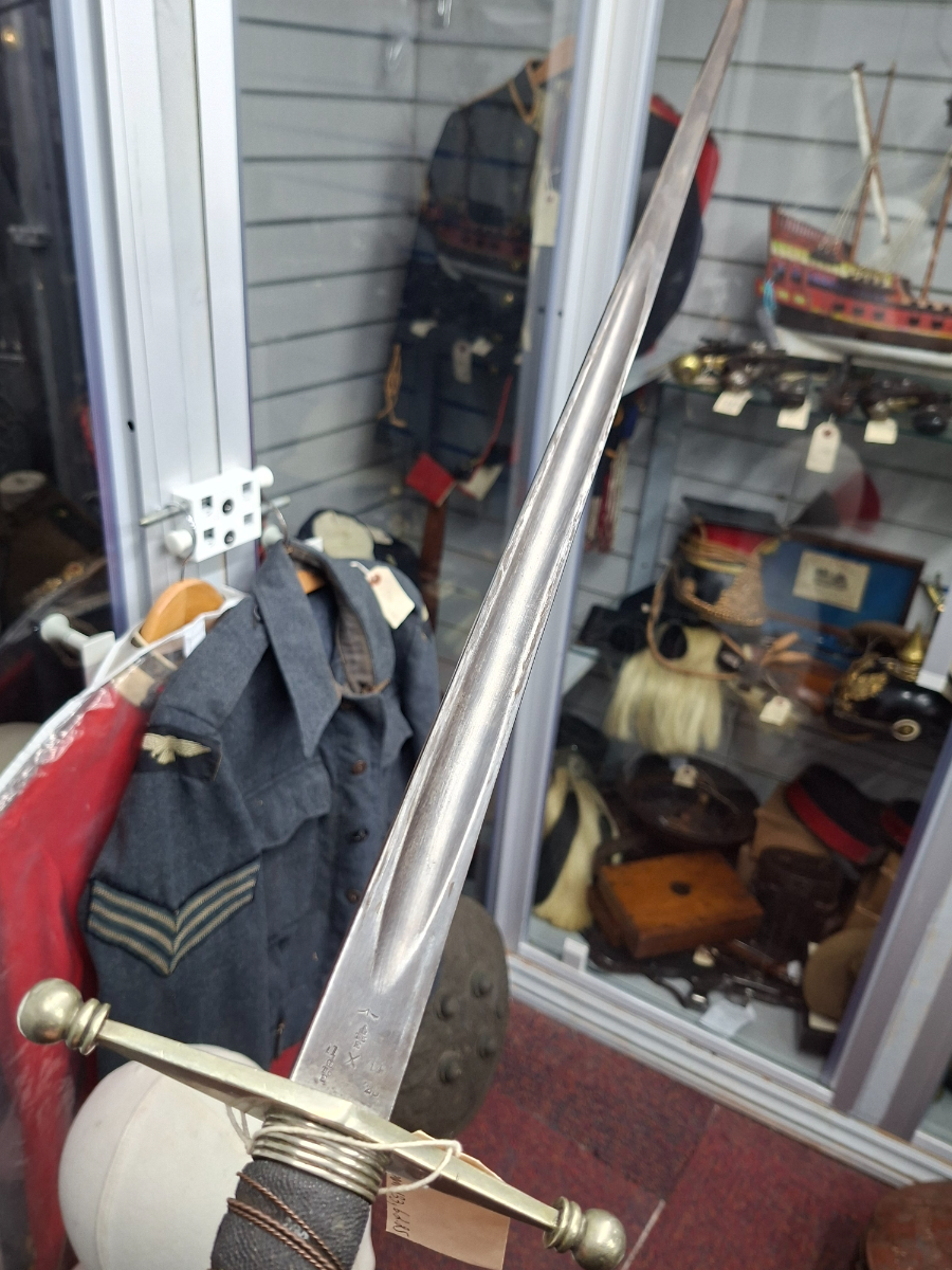 A lovely Scottish SNCO's 1865 Pattern Scottish cross hilt broad sword. Proof marked 1911, 1914 and 1925. Bend tested, WD marked and bend tested by Enfield.