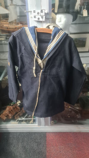 Discover authentic Royal Navy undress blouses and trousers from HMS Chatham at Suvla Bay, Gallipoli. Owned by signaller John Stanley Lockwood. Shop now and commemorate history!