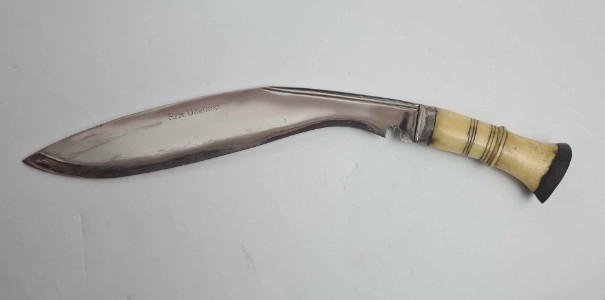 Discover our WW2 period bone hilted kukri, ideal for collectors. Admire its unique Newari carving and quality nickel plating. Named to Rifleman Osborne, it's in mint condition!