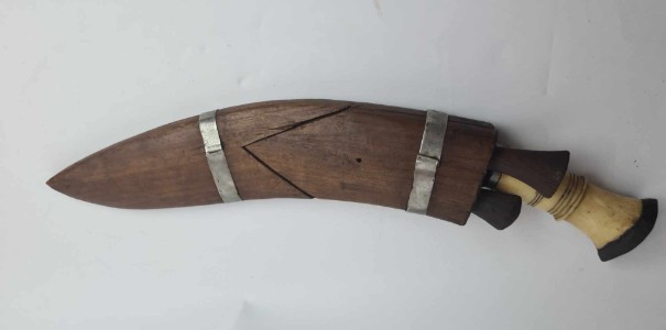 Discover our WW2 period bone hilted kukri, ideal for collectors. Admire its unique Newari carving and quality nickel plating. Named to Rifleman Osborne, it's in mint condition!