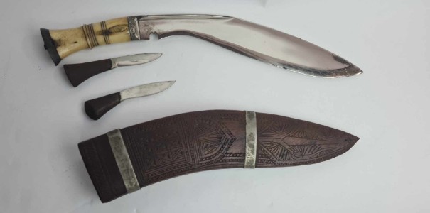 Discover our WW2 period bone hilted kukri, ideal for collectors. Admire its unique Newari carving and quality nickel plating. Named to Rifleman Osborne, it's in mint condition!
