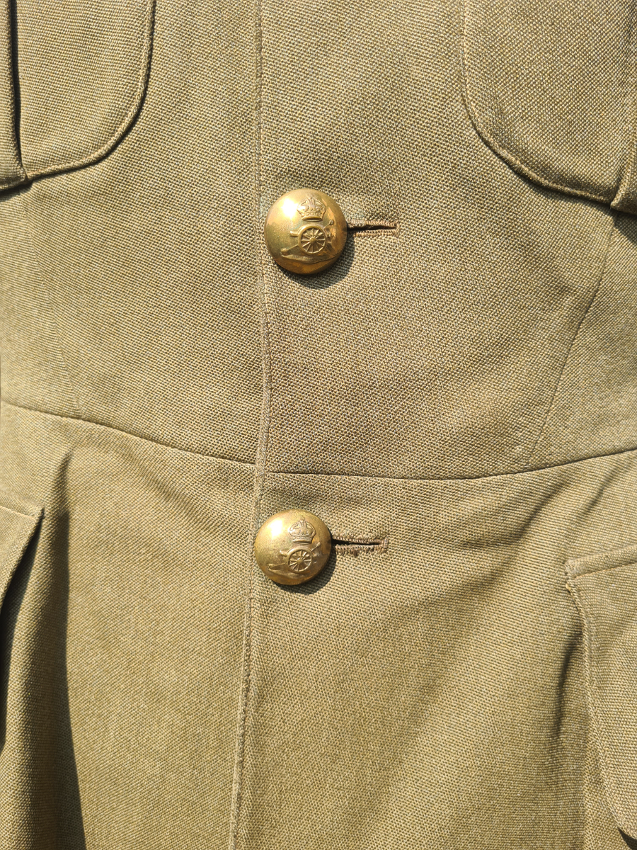 Explore our collection of WW2 Royal Artillery Officers Service Dress Jackets. Authentic, undated pieces in used condition. Shop now for rare military memorabilia.