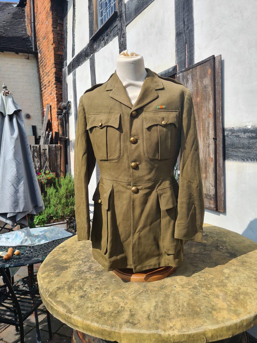 Explore our collection of WW2 Royal Artillery Officers Service Dress Jackets. Authentic, undated pieces in used condition. Shop now for rare military memorabilia.