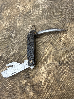 A lovely early war Royal Navy jack knife/multi tool by Empire. No date.

Believed to be early war due to the use of brass which increasingly become in short supply from 1943 onwards and was replaced by lesser vital materials.