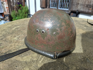 Explore our collection of vintage WZ. 63 Polish Paratroopers Helmets. See the 1963/65 edition with a unique brown leather cap. Shop now and own a piece of history!