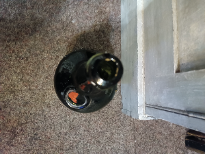 Discover our rare 1890-1910 French Benedictine glass bottle with a wax seal. At 27 cm tall it's a must for any collector. Shop now for antique treasures!