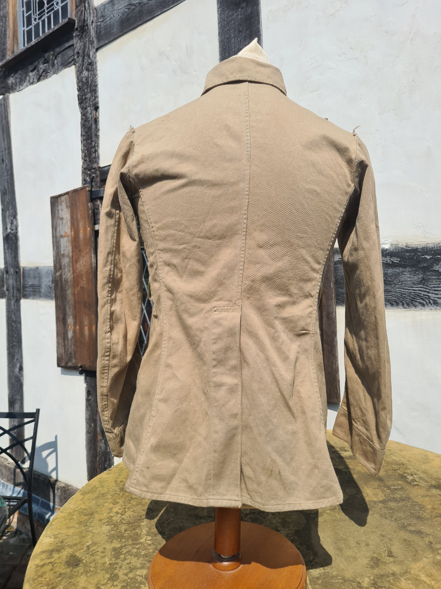 Explore our unique collection of early war Khaki Drill products with detailed specifications. Don't miss our rare 1940 officer's cook uniform! Shop now to add a piece of history to your collection.