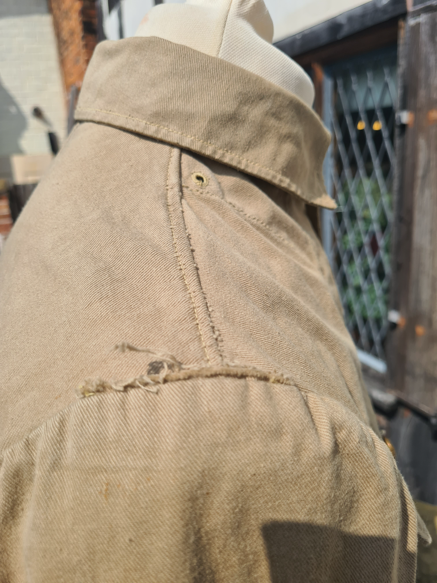 Explore our unique collection of early war Khaki Drill products with detailed specifications. Don't miss our rare 1940 officer's cook uniform! Shop now to add a piece of history to your collection.