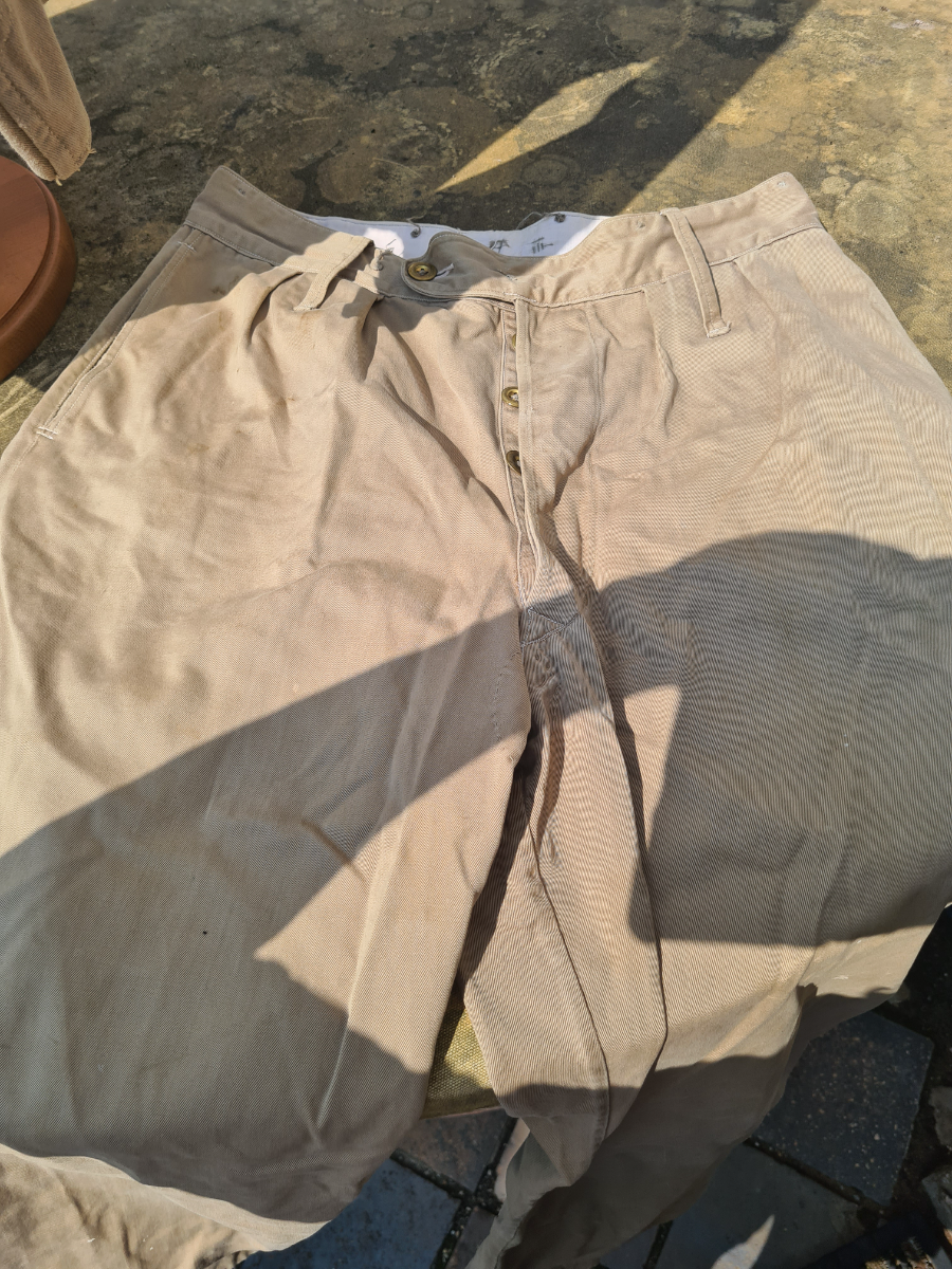 Explore our unique collection of early war Khaki Drill products with detailed specifications. Don't miss our rare 1940 officer's cook uniform! Shop now to add a piece of history to your collection.