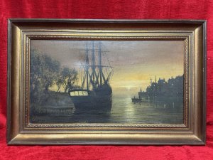 Moonlit Masted Galleon Ship In Harbour Scene Oil Painting Signed Framed. Circa - 192. Composition - Oil On Canvas. Listing Description. Richly Painted Moonlit Harbour Scene With Wooden Vessels And Townscape. Large Three Masted Galleon Takes Pride Of Place In Artwork Docked Next To Tree Line ,Figures Sail In Row Boat Towards Land Where You can See Lights From Houses In Distance. Stunning Detailed Oil Painting , Competent Use Of Light And Shadow by Accomplished Artist. Set In Gilt Wood Frame. Signed by Artist Adams. Dimensions In Cms. Height 38.5cm X Width 60cm. For Further Information Please Call The Museum Curator on 07707 488566 Thank-you.
