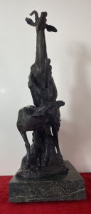 French bronze centrepiece sculpture, circa 1890, signed by artist B C Shuy and mounted on a rectangular green marble plinth. The composition depicts a rearing Lichtenstein’s impala alongside a cowering gazelle, with finely sculpted facial features, eyes, horns, hooves and musculature conveying grace and movement. Reported provenance: formerly exhibited in a Paris museum during the 1970s, previously the property of a noble gentleman, and now part of the private Lord Hill Museum collection. Dimensions: 9.5 inches high × 10.25 inches wide × 6.75 inches deep. Approximate weight: 30 kg. For international postage, please request a quote before purchase.