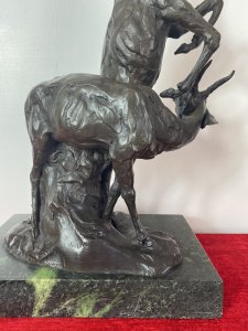 French bronze centrepiece sculpture, circa 1890, signed by artist B C Shuy and mounted on a rectangular green marble plinth. The composition depicts a rearing Lichtenstein’s impala alongside a cowering gazelle, with finely sculpted facial features, eyes, horns, hooves and musculature conveying grace and movement. Reported provenance: formerly exhibited in a Paris museum during the 1970s, previously the property of a noble gentleman, and now part of the private Lord Hill Museum collection. Dimensions: 9.5 inches high × 10.25 inches wide × 6.75 inches deep. Approximate weight: 30 kg. For international postage, please request a quote before purchase.