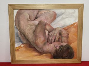 Contemporary nude study in oil on board by Claude Michael Jenkins, presented in a pine frame. The composition depicts a reclining brunette model with her hair tied back and her hands crossed against her face. Carefully rendered hands and a slightly contorted pose are complemented by peach and varied flesh tones, with a white blanket providing contrast. According to the supplied exhibition history, the painting appeared in the artist’s Naked Form exhibition, held from May to July 2010 in the Howgill Gallery at Farfield Mill Arts and Heritage Centre. Born in London, Jenkins was educated in England, Scotland and Germany, taught in Oxford, Canada and Scotland, and lived and worked in the Lake District from 1972. He retired in 1996 and died in 2011. Dimensions: 22.5 inches high × 18.25 inches wide.