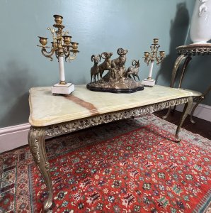 French Louis XVI Style Onyx Marble & Brass Filigree Ormolu Coffee/Centre Table Circa - 1950's Composition - Onyx Marble Top With Brass Base Listing Description French Vintage Decorative Louis XVI Style Coffee/ Centre Table. Solid Onyx Marble Top With Bevelled Edge In Jade Green Colouration / Rust Veins. Ornate Base Of Brass Ormolu In Acanthus Leaf Filigree Patter-nation Standing On Sabre Legs. Heavy Item Dimensions In CMS Height 41cm X Length 98.5cm X Depth 48cm For Any Further Information Please Call 07707 488 566 Thank-you