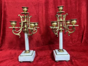 Pair Of French Louis XVI Style Bronze Ormolu/Marble Five Branch Candelabras Circa - 1890 Composition - Bronze Ormolu Listing Description Magnificent French Late 19th Century Bronze Ormolu And White Marble Five Branch Pair Of Candelabras In The Louis XVI Style. Upon The Leading Central Marble Column Pedestal Stands The Tallest Candle Sconce As A Pinnacle. Four Acanthus Scroll Arms Sit Underneath And Support The Candle Sconces In Classical Urn Shape, All Sconces Decorated With Folate Shaped Drip Pans. Set Upon Square Marble Bases With Quadrant Of Bun Feet. Exceptional Parisian Pair In Lovely Condition. Dimensions In Inches Height 13" X Width 6' x Depth 3.5 SQ Base For Further Information Please Call 07707 488 566 Thank-you