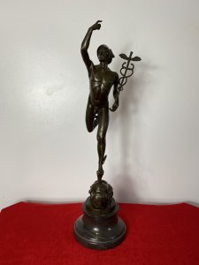 Fine Bronze Romanesque Sculpture Statue Of Hermes After Giambologna On Marble Plinth Signed. Circa - Late 19th Century Composition- Bronze A Fine & Exceptionally Executed Sculptured Bronze Statue Hermes Belvedere Beautifully Posed Holding A Mace With Talaria (Winged Shoes) And Helmet. Stands Upon A Child’s Fountain Head. Hermes Was Notoriously Messenger To The Gods. Stamped And Signed On The Base And Set On Stepped Curricular Black Marble Plinth. Grand Tour Style Object Of Virtue. Signed G . da Bologna No A7255 Stamped Paris Medallion - BRONZE GARANTI PARIS J B DEPOSEE Dimensions In Inches Height 23” Base Diameter 6”