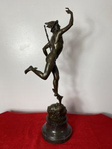 Fine Bronze Romanesque Sculpture Statue Of Hermes After Giambologna On Marble Plinth Signed. Circa - Late 19th Century Composition- Bronze A Fine & Exceptionally Executed Sculptured Bronze Statue Hermes Belvedere Beautifully Posed Holding A Mace With Talaria (Winged Shoes) And Helmet. Stands Upon A Child’s Fountain Head. Hermes Was Notoriously Messenger To The Gods. Stamped And Signed On The Base And Set On Stepped Curricular Black Marble Plinth. Grand Tour Style Object Of Virtue. Signed G . da Bologna No A7255 Stamped Paris Medallion - BRONZE GARANTI PARIS J B DEPOSEE Dimensions In Inches Height 23” Base Diameter 6”