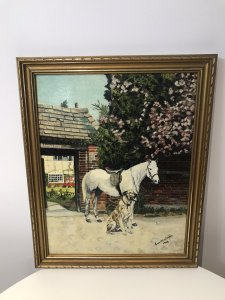 Vintage Original Oil Painting Titled Friends Dog With A Horse By Artist Eva Weelies. Medium - Oil Circa - 1970 Condition- Lovely Used Original Portrait Was A Postcard By Famous Dog Trainer Barbara Woodhouse. This Oil Painting Is A Interpretation From That Postcard Showing A Grey Horse And Dog Named Juno Standing In A Garden Of Beautiful Home Presumably Barbera Woodhouse’s. Lots Of Vivid Colour And Stunning Detail In This Painting. Very Well Executed Painting With A Lovely Subject. Lovely Guilt Frame. Signed By Artist EVA M Weelies Dated 1973 Dimensions In Inches Height 20” Width 16”