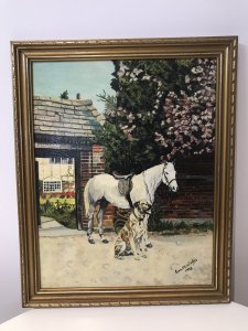 Vintage Original Oil Painting Titled Friends Dog With A Horse By Artist Eva Weelies. Medium - Oil Circa - 1970 Condition- Lovely Used Original Portrait Was A Postcard By Famous Dog Trainer Barbara Woodhouse. This Oil Painting Is A Interpretation From That Postcard Showing A Grey Horse And Dog Named Juno Standing In A Garden Of Beautiful Home Presumably Barbera Woodhouse’s. Lots Of Vivid Colour And Stunning Detail In This Painting. Very Well Executed Painting With A Lovely Subject. Lovely Guilt Frame. Signed By Artist EVA M Weelies Dated 1973 Dimensions In Inches Height 20” Width 16”