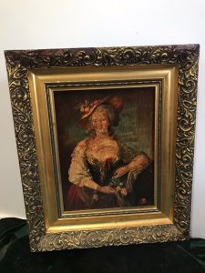 Vintage Oleograph In The Style Of Gainsborough Lady In Elaborate Gown Framed. 18th Century Lady Wearing A Large Hat And Holding Flowers Impressive Bright Colours Delightful Image With High Quality Classical Look Set In Ornate Gilt Acanthus Leaf Frame Composition- Oleograph Has Been Varnished Dimensions In Inches Height 15.5” Width 13” Frame Depth 1.5”